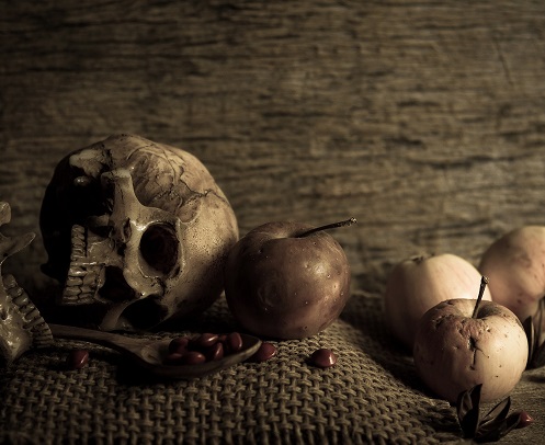 'Broken Skull Beside Apples and Spoon' from public domain site Pexels